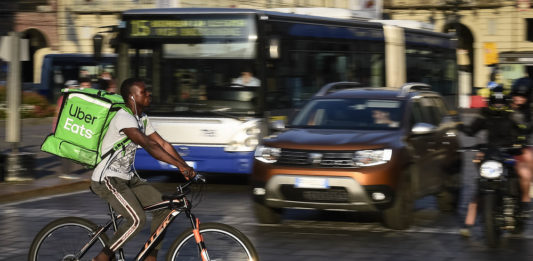 Meals on wheels: An Uber Eats courier in Turin