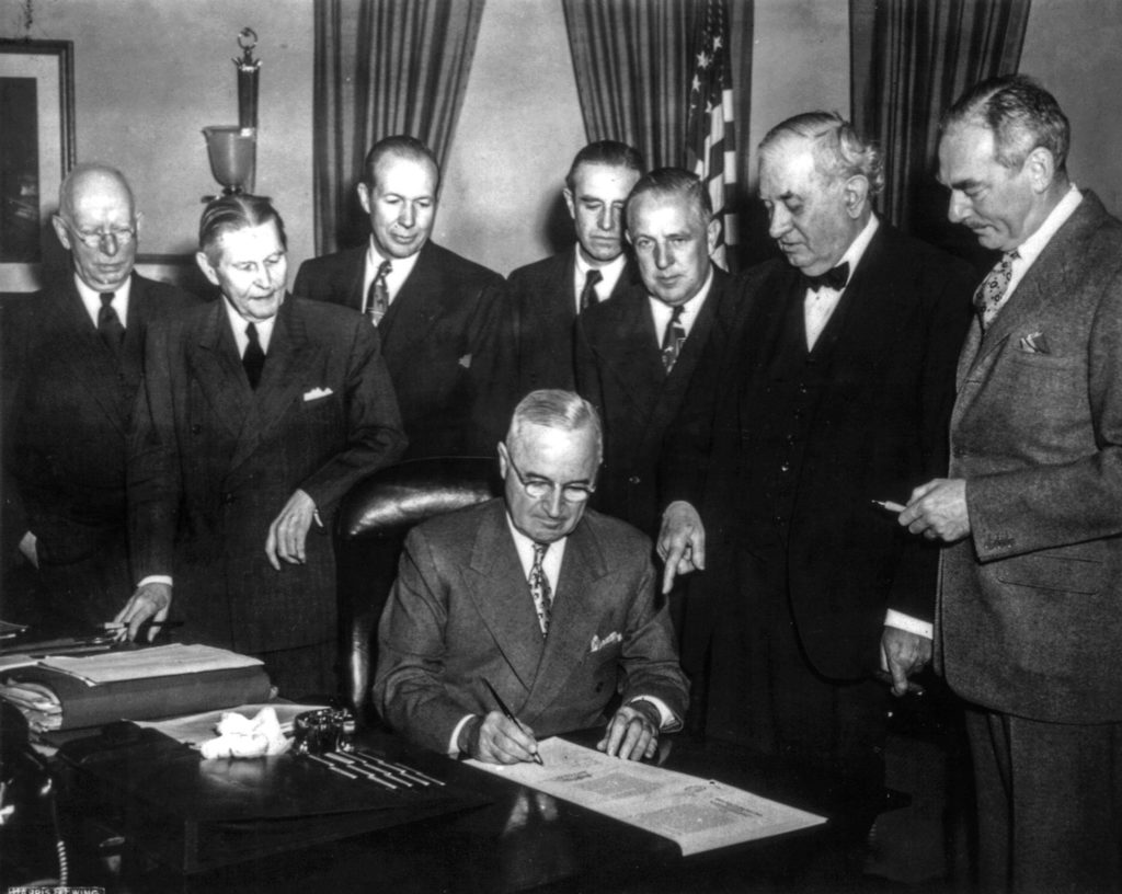 Marshall Plan, President Truman Signs The Economic Assistance Act, A Program For The Reconstruction Of Europe. (dean Acheson On The Right)april 19, 1949