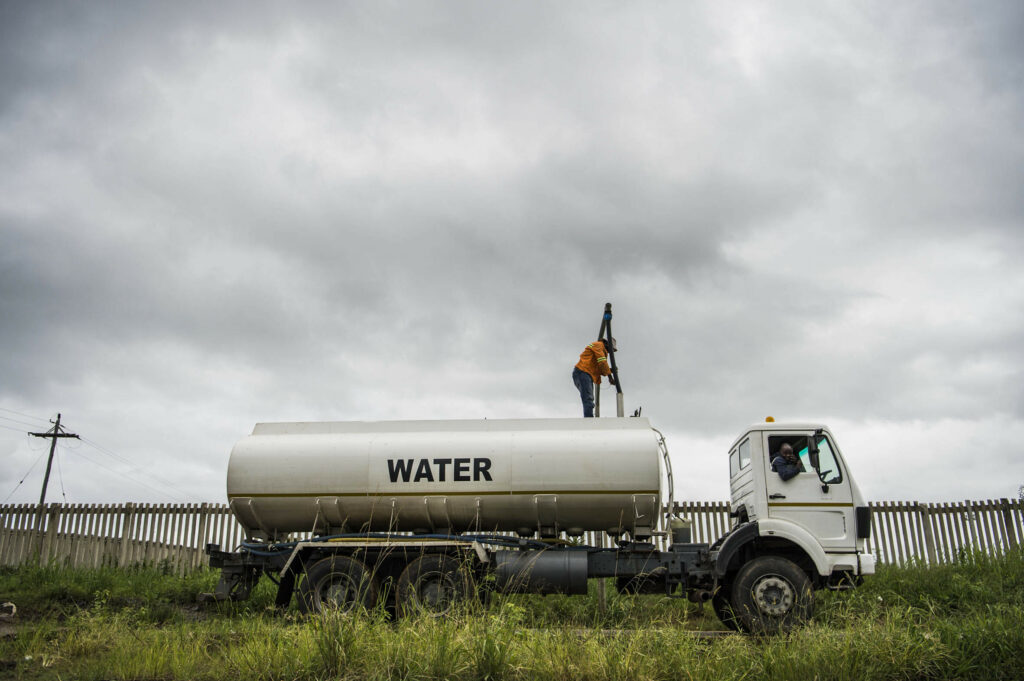 Water Trucks Fill Up And Transport Water To The Reservoir Photo Delwyn Verasamy