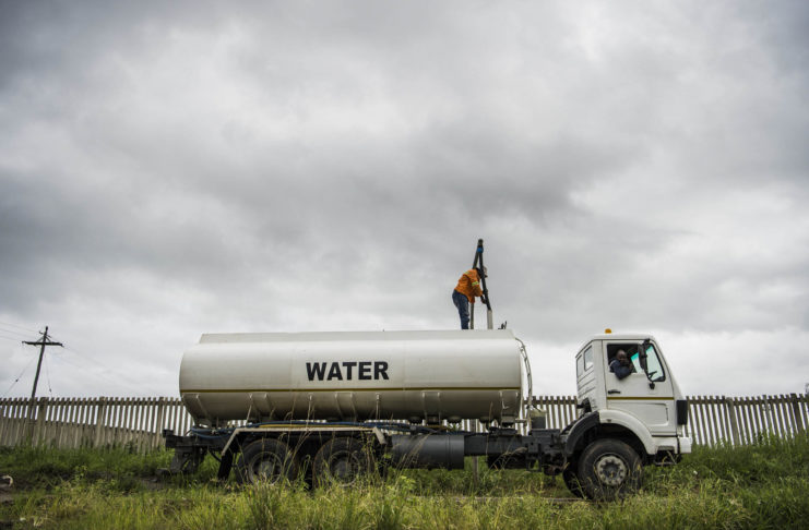 Water Trucks Fill Up And Transport Water To The Reservoir Photo Delwyn Verasamy