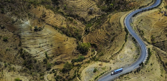 Aerial View Of A Truck Passing In The Konso Hills And Terraces, Omo Valley, Konso, Ethiopia