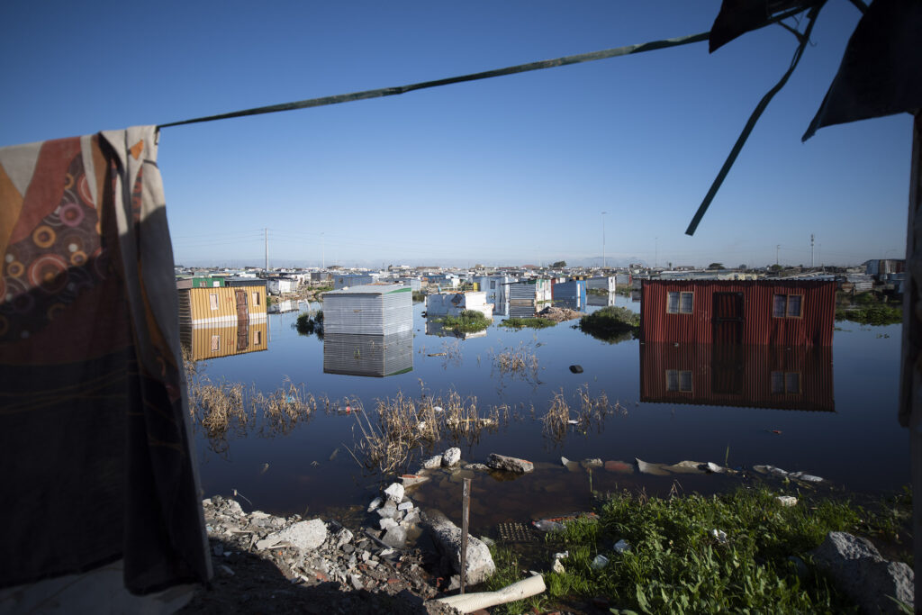 July 06 2020 Heavy Winter Rains & An Overflowing Sewerage Pipe Have Flooded Areas Of Ethembeni In Khayelitsha. Photo By David Harrison