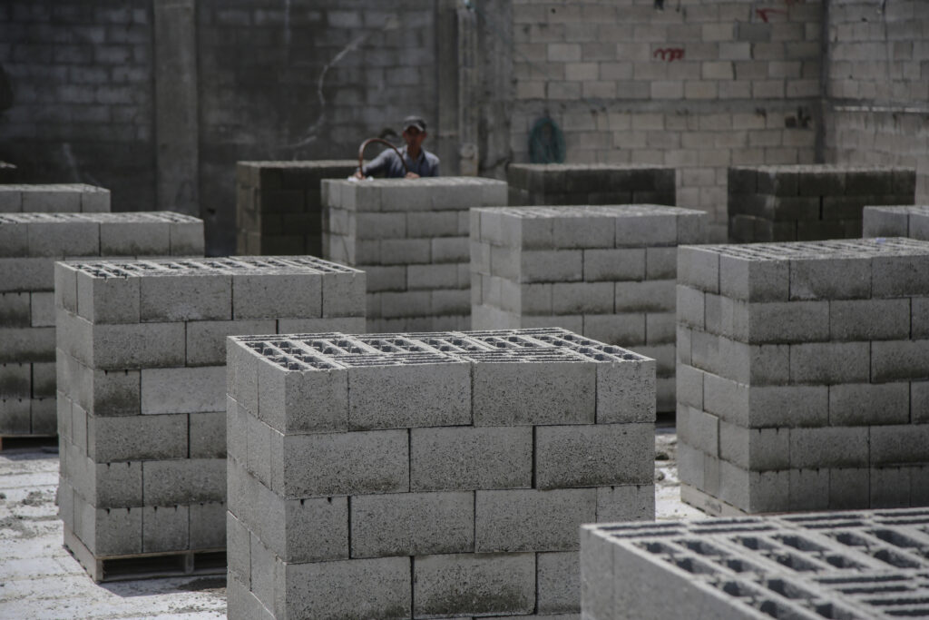 A Palestinian Man Working In A Factory That Recycles Rubble