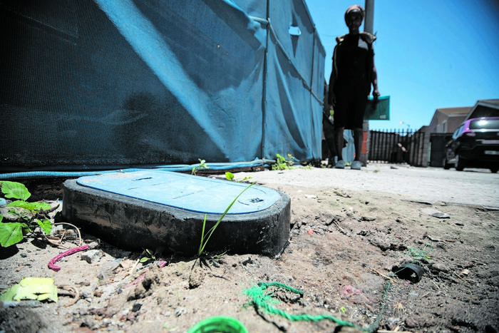 Leaking: A City Of Cape Town Water Management Device (weapon Of Mass Destruction) Installed In The Beacon Valley Community Of Mitchells Plein, Wednesday 17 January 2024.