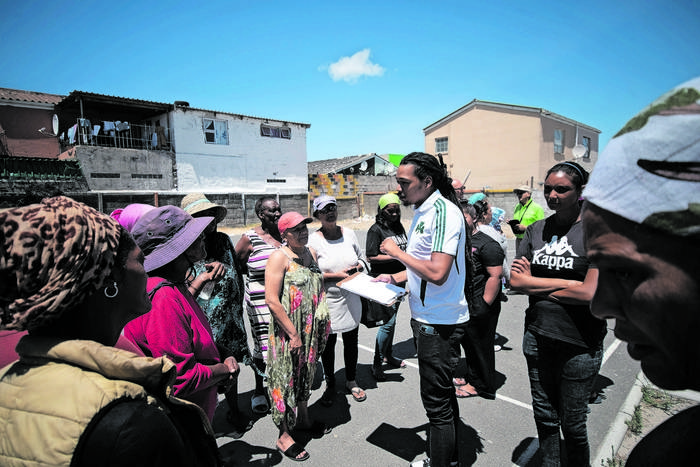 Beacon Valley Community Activist Joseph Jacobs (white Shirt) Talks To A Group Of Fed Up Residents Who Are Tired Of Struggling To Access Water. Wednesday 17 January 2024. (photo: David Harrison)