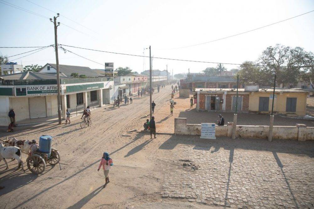 Locals Walk Through Ambovombe, A City In Southern Madagascar