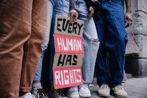 Group Of People Marching For Human Rights In New York City.