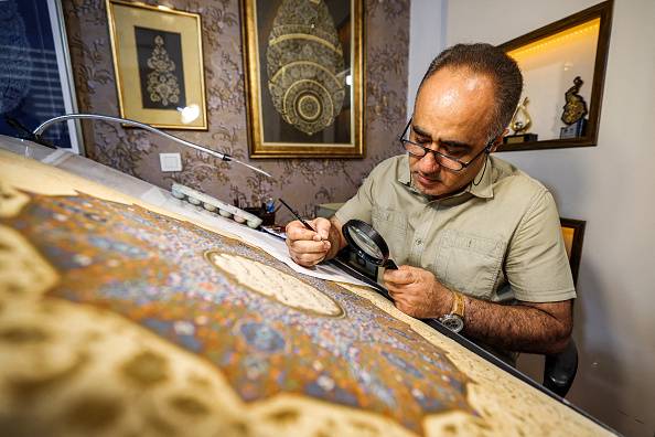 Master Illuminator Mohammad Hossein Aghamiri’s timeless art