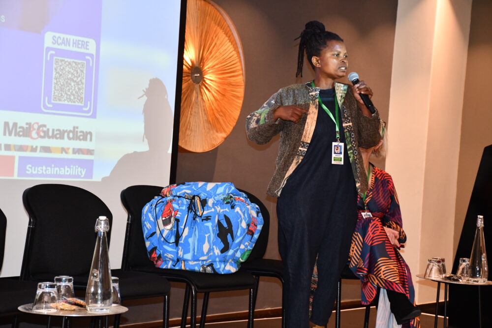 Mamosweu Tsoabi From Serapeng Sa Ditlhare Demonstrating Renewable Energy Innovations Such As A Cooking Bag