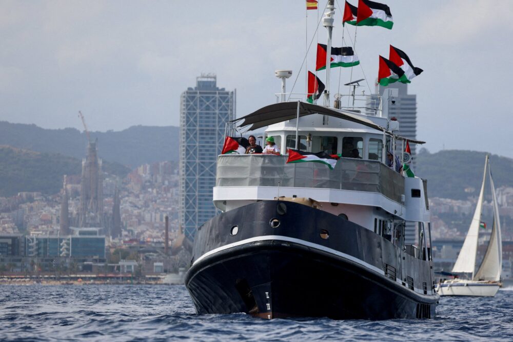 Gaza flotilla sails on despite attacks