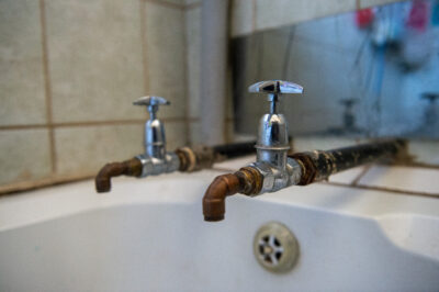 Dry taps and broken promises: The erosion of gender equality