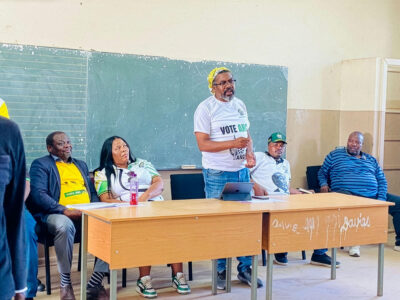 Lulama Ngcukayitobi raises his hand