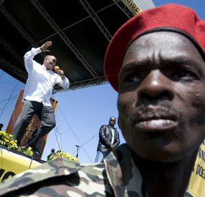 Jacob Zuma, guarded by heavies, wows the crowd with a little jig at the ANC’s manifesto launch at Khayelitsha Sports Stadium last month. Photo: David Harrison